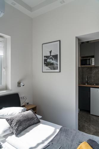 Katil atau katil-katil dalam bilik di Balatonic Lemon apartmanház