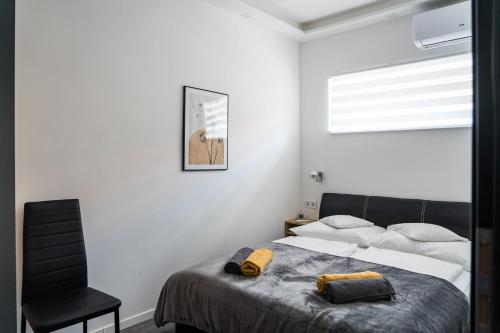 Katil atau katil-katil dalam bilik di Balatonic Lemon apartmanház