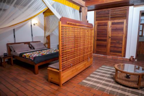Katil atau katil-katil dalam bilik di Coccinelle appartements