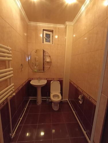 a bathroom with a toilet and a sink at Green Paradise in Ijevan