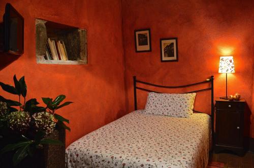 Ein Bett oder Betten in einem Zimmer der Unterkunft Il Viaggiatore