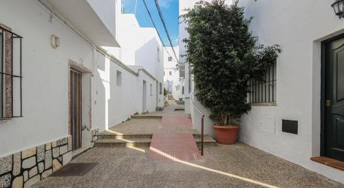 Extramuros Town house with roof terrace and sea view in the center of Conil