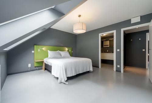 Кровать или кровати в номере Smartflats Design - Postiers