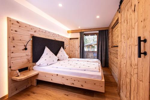 En eller flere senge i et værelse på Gasthof-Ferienwohnungen Dürrlehen