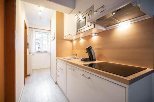 Kuchyň nebo kuchyňský kout v ubytování Strandburg 207