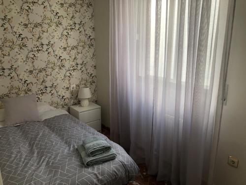 Cama ou camas em um quarto em Alojamiento Mirasierra
