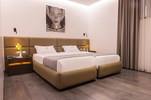 Postel nebo postele na pokoji v ubytování Maritim Marina Bay Resort SPA & Casino