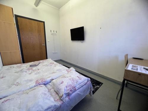 Postel nebo postele na pokoji v ubytování Office House Services 670