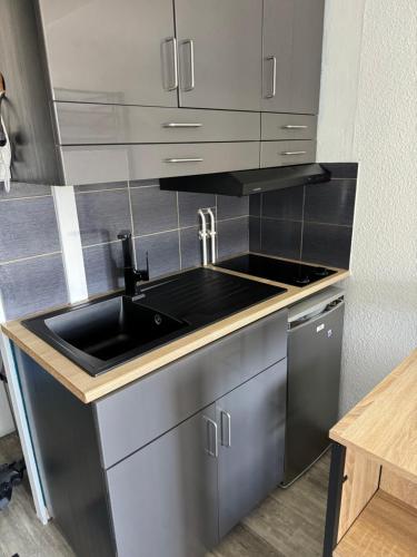 Kuchyň nebo kuchyňský kout v ubytování Studio Arc 1600