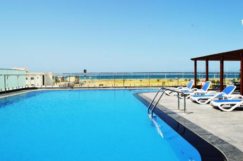 Bazén v ubytování Sur Grand Hotel nebo v jeho okolí