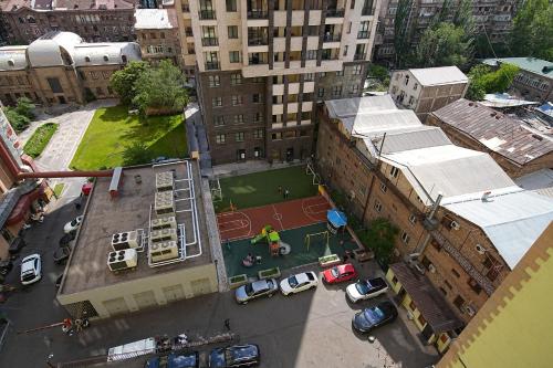 an overhead view of a basketball court in a city at Sweet Home Apart-Hotel in Yerevan