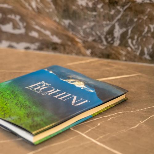 a book sitting on top of a table at Studio Barbara in Bohinj