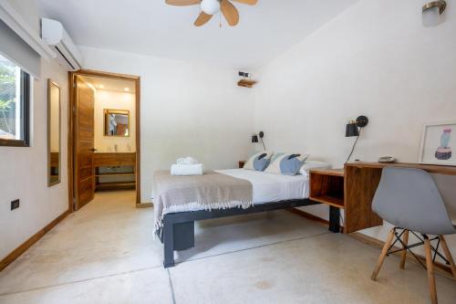 Ένα ή περισσότερα κρεβάτια σε δωμάτιο στο Believe Surf & Yoga Lodge Santa Teresa