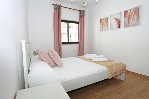 Postel nebo postele na pokoji v ubytování Quinta Amparo Holiday Apartment
