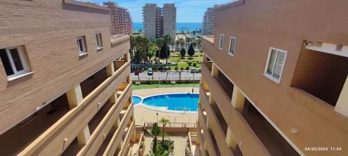 Bazén v ubytování Costa Caribe I World, Classic - ServHouse nebo v jeho okolí