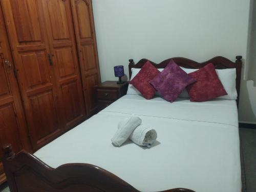 Łóżko lub łóżka w pokoju w obiekcie Villa salma