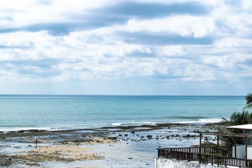 a view of the ocean from a beach at Flat Pipa Oceano in Pipa