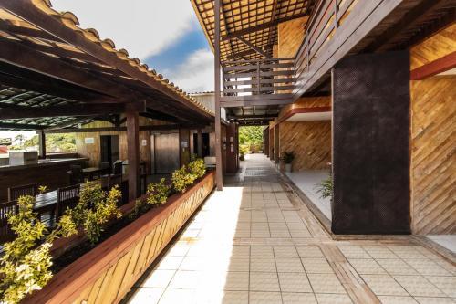 an external view of a building with a walkway at Flat Pipa Oceano in Pipa