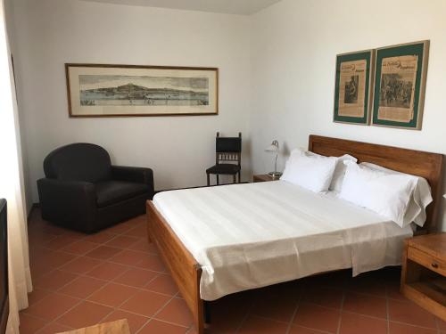 Tempat tidur dalam kamar di Ristolab - Ritiro Mediterraneo