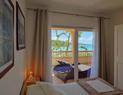 Posteľ alebo postele v izbe v ubytovaní Apartment in Kampor with sea view, balcony, air conditioning, WiFi (4838-1)