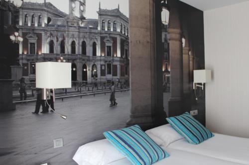 Cama o camas de una habitación en ELE Enara Boutique Hotel
