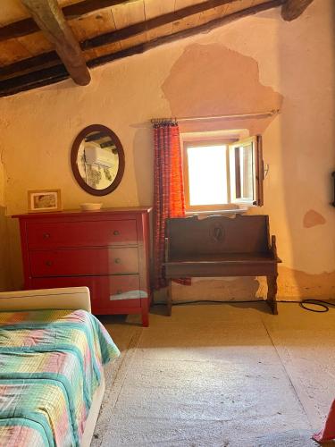 Кровать или кровати в номере la casa del calicanto