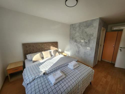 Postel nebo postele na pokoji v ubytování Medjugorje Boutique Hotel PHOENIX