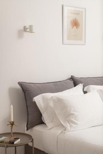 Ένα ή περισσότερα κρεβάτια σε δωμάτιο στο Thelèsi Apartments, 100m from the beach