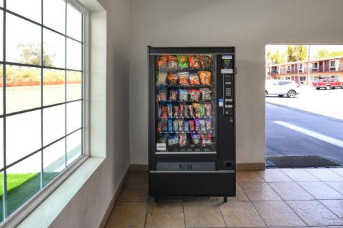 a vending machine with food and drinks in a building at Hyland Inn near Legoland in Carlsbad