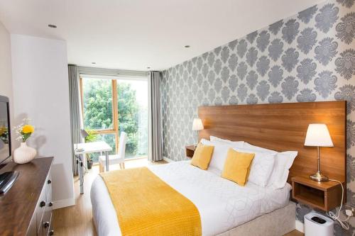 Ένα ή περισσότερα κρεβάτια σε δωμάτιο στο Luxury Apartment in Dublin