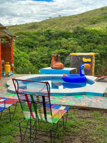 a childrens play park with a play table and chairs at La Bota del Gigante in Gigante