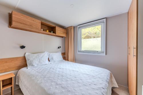 Postel nebo postele na pokoji v ubytování Havre de paix Gastes MH 704