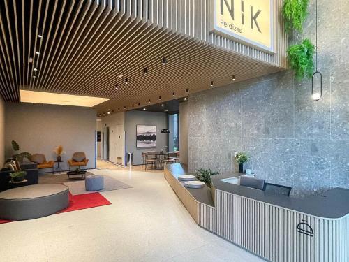 a lobby of a hospital with a waiting room at Nik Perdizes - Studios por temporada in Sao Paulo
