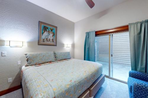 a bedroom with a bed and a window at Pend Oreille Hideaway in Dover