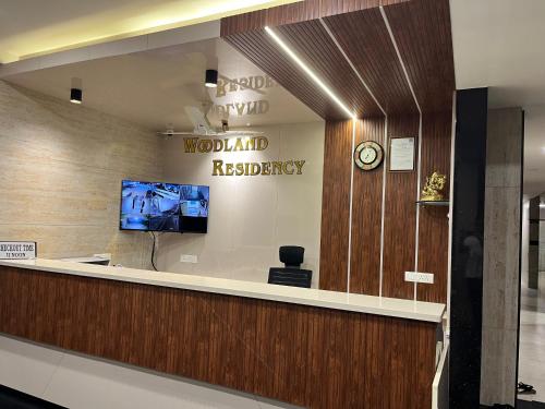 Lobi atau kawasan kaunter penerimaan di Woodland residency