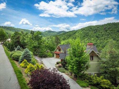 an aerial view of a house in the mountains at Frolly Falls in Black Mountain