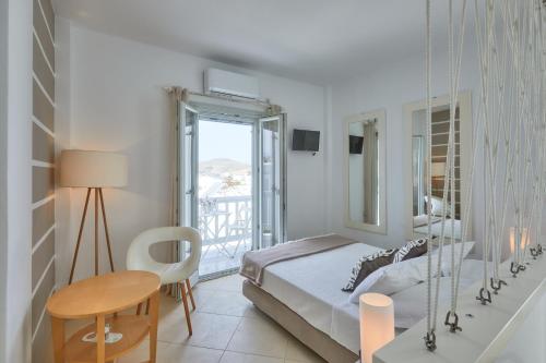 Posteľ alebo postele v izbe v ubytovaní Romantica Suites
