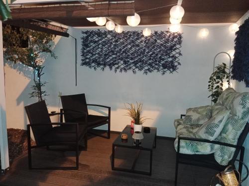 Ein Sitzbereich in der Unterkunft Mini Casa cerca del Mar