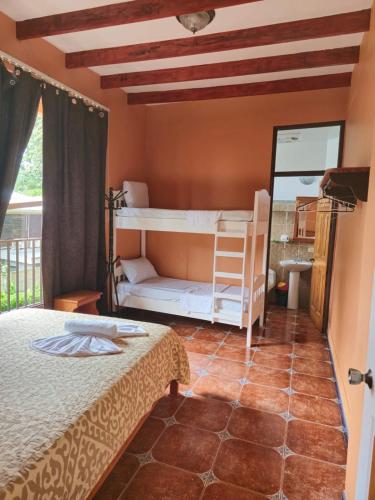 Ένα ή περισσότερα κρεβάτια σε δωμάτιο στο Apartahotel Playa Luna