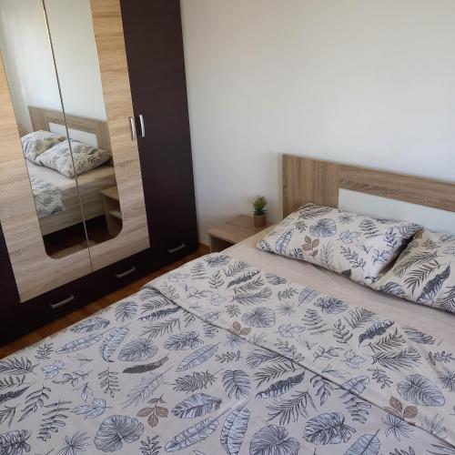 Postel nebo postele na pokoji v ubytování Apartman MG