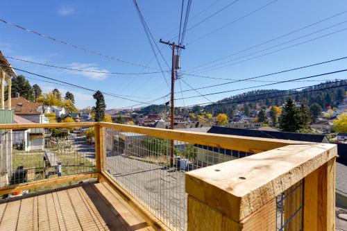 a balcony with a view of a city at Centrally-Located Mountain Getaway in Lead! in Lead