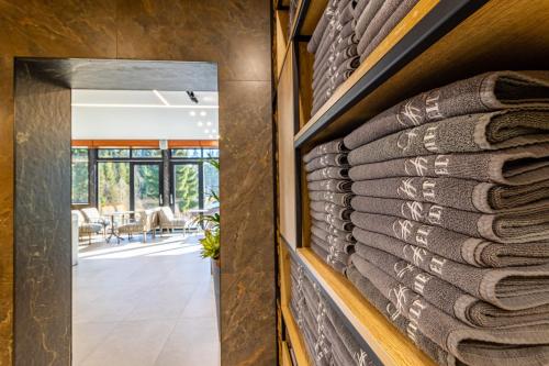 a wall of pillows on the wall of a house at Shelter Apart Hotel in Bukovel