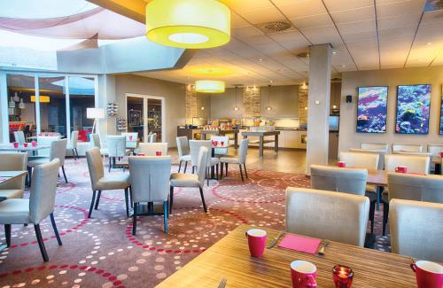 Χώρος καθιστικού στο Leonardo Hotel Mannheim-Ladenburg