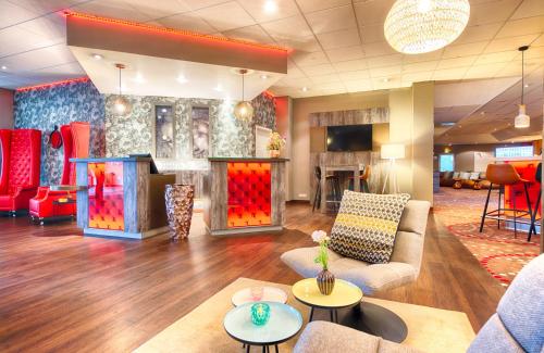 Χώρος καθιστικού στο Leonardo Hotel Mannheim-Ladenburg