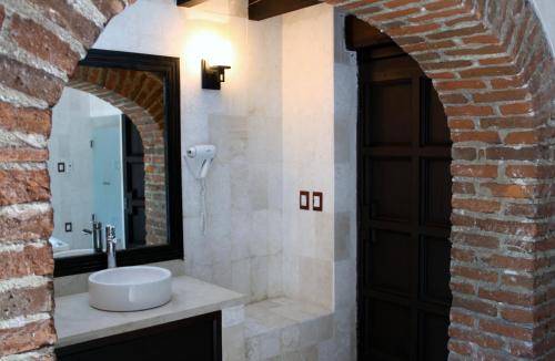 Phòng tắm tại Hotel Hacienda Vista Hermosa