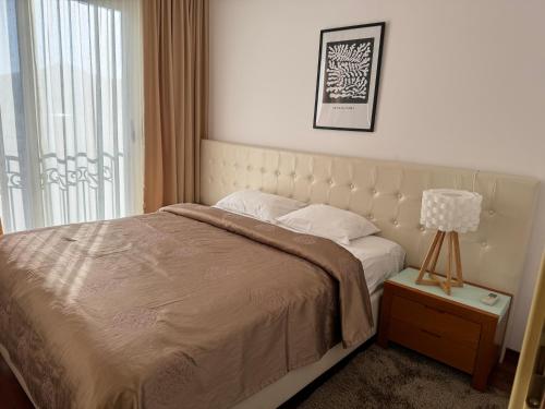 Postel nebo postele na pokoji v ubytování Viola Di Mare Apartments