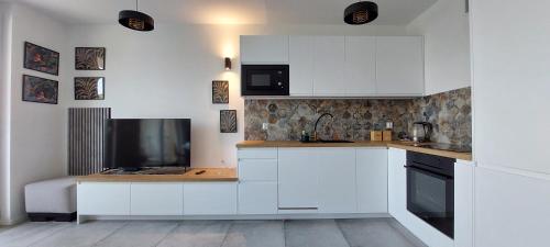 Η κουζίνα ή μικρή κουζίνα στο Apartament Santorini
