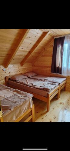 Ένα ή περισσότερα κρεβάτια σε δωμάτιο στο Tosic