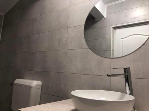 Et badeværelse på Apartament Orizont