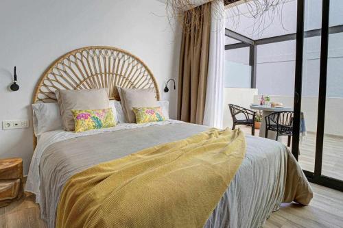 Postel nebo postele na pokoji v ubytování Jable suites apartamentos de lujo en el centro